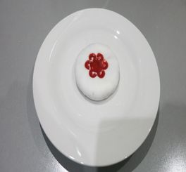 A picture of a biscuit which has been decorated.